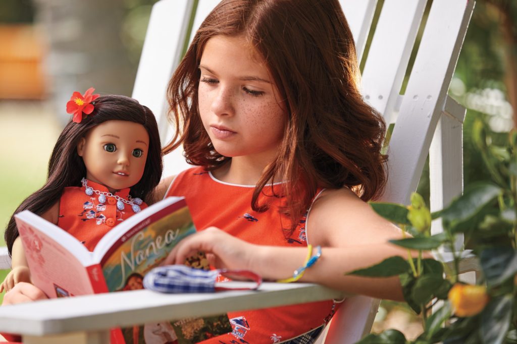 https://toyqueen.com/wp-content/uploads/2017/08/Girl-Reading-with-Nanea-Doll-LR-1024x682.jpg